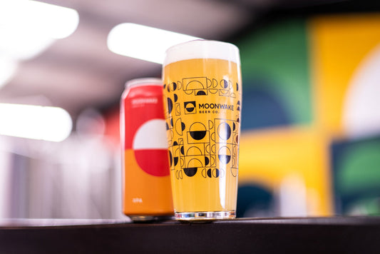 Fresh pint of beer and Pizza Geeks pizza at Moonwake taproom in Leith